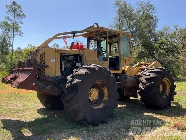 Timberjack 460 Skiedrovežiai