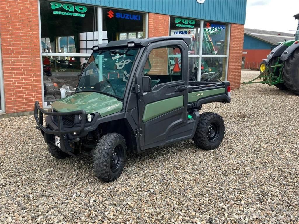 John Deere 865M Visureigiai