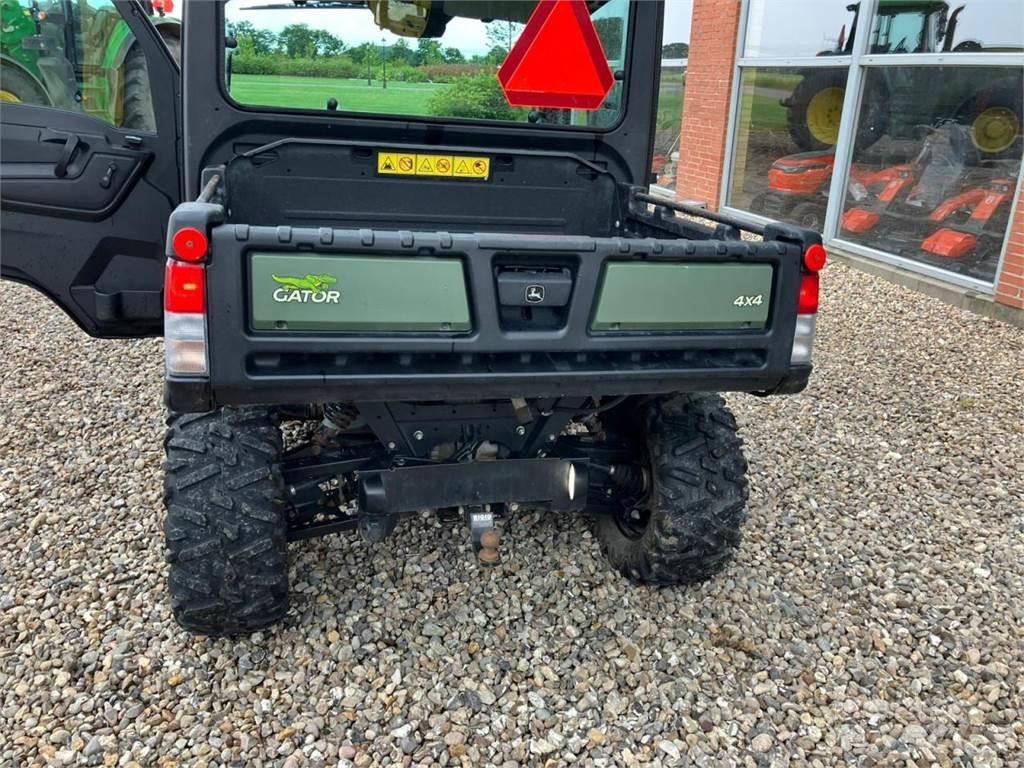 John Deere 865M Visureigiai