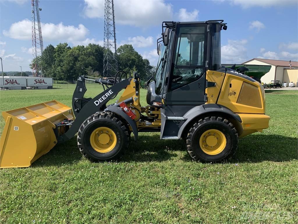 John Deere 244L Naudoti ratiniai krautuvai