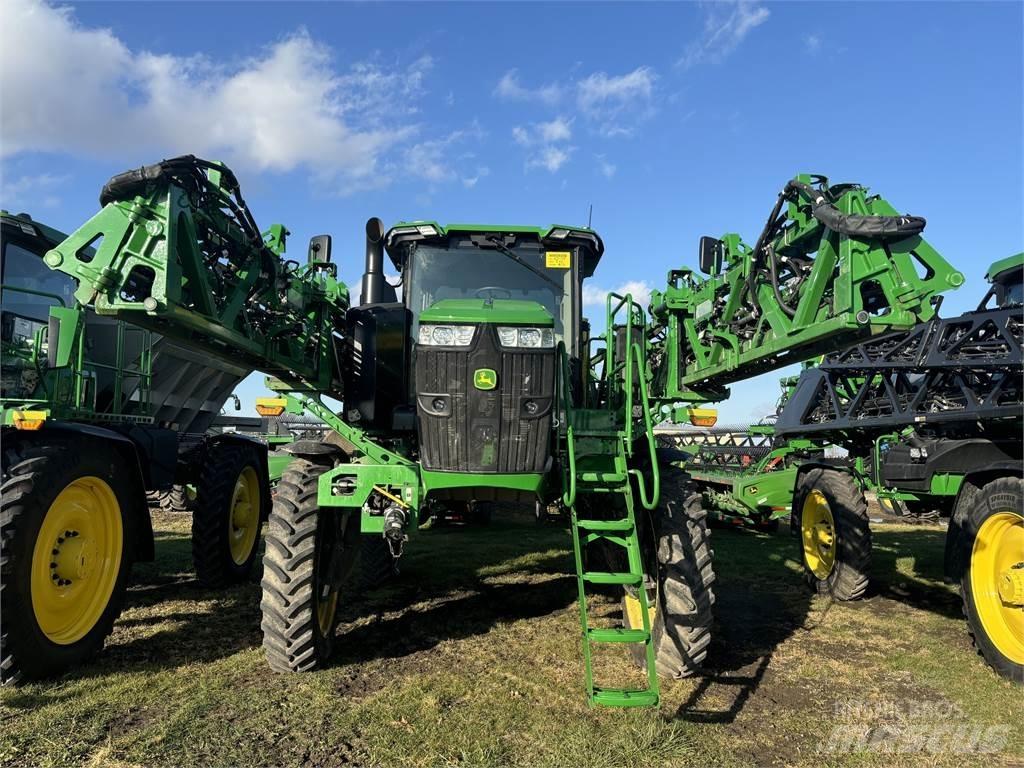 John Deere 412R Prikabinami purkštuvai