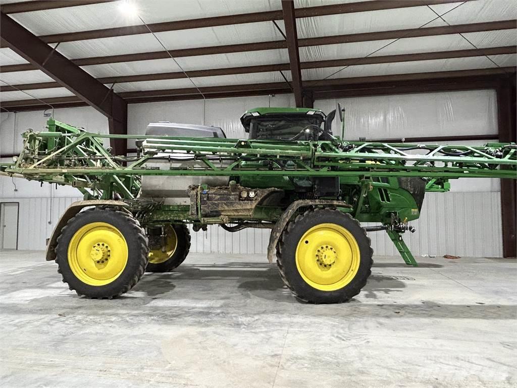 John Deere 412R Prikabinami purkštuvai