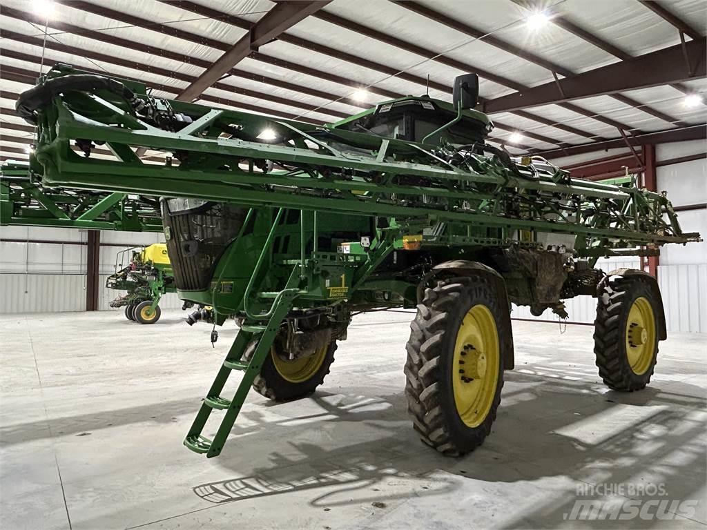 John Deere 412R Prikabinami purkštuvai
