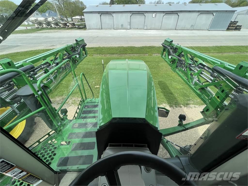 John Deere 412R Prikabinami purkštuvai