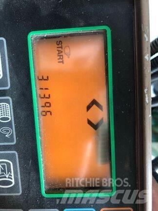 John Deere 590 Ritinių presai