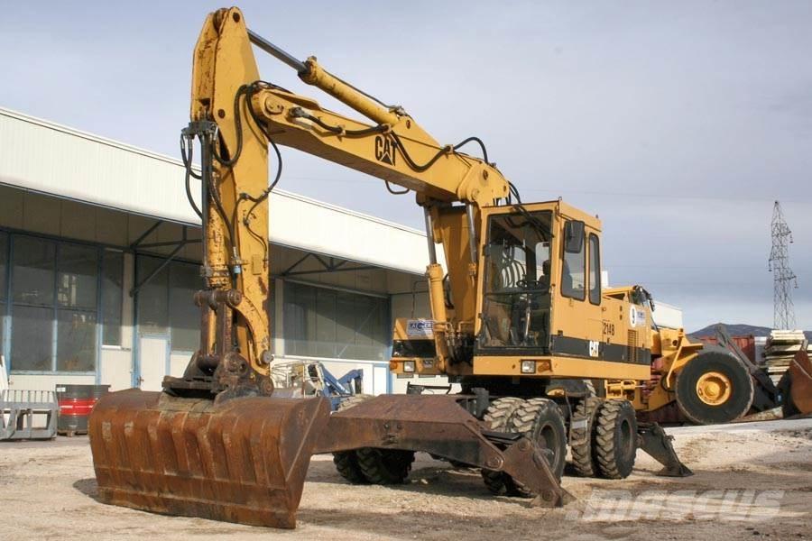 CAT 214B Ratiniai ekskavatoriai