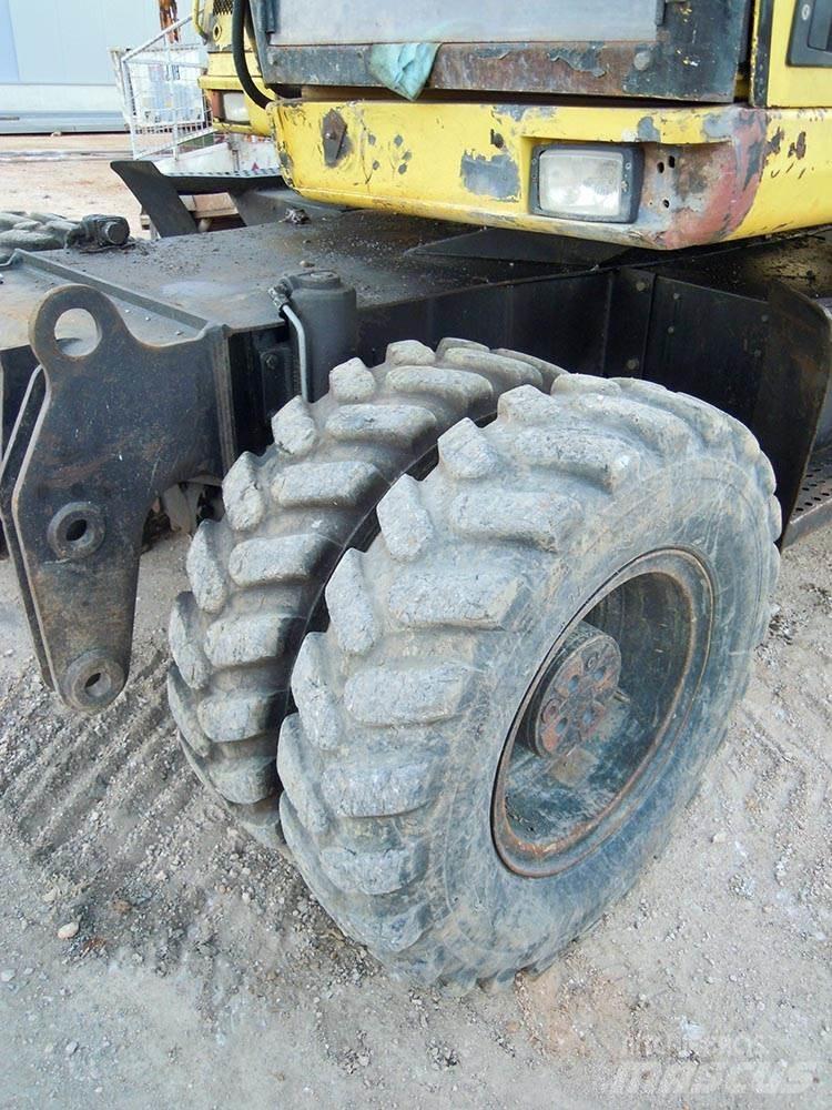 CAT M312 Ratiniai ekskavatoriai