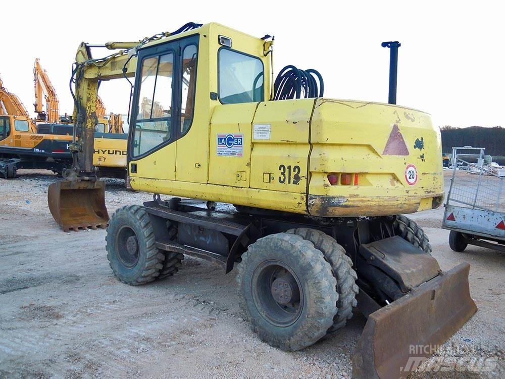 CAT M312 Ratiniai ekskavatoriai