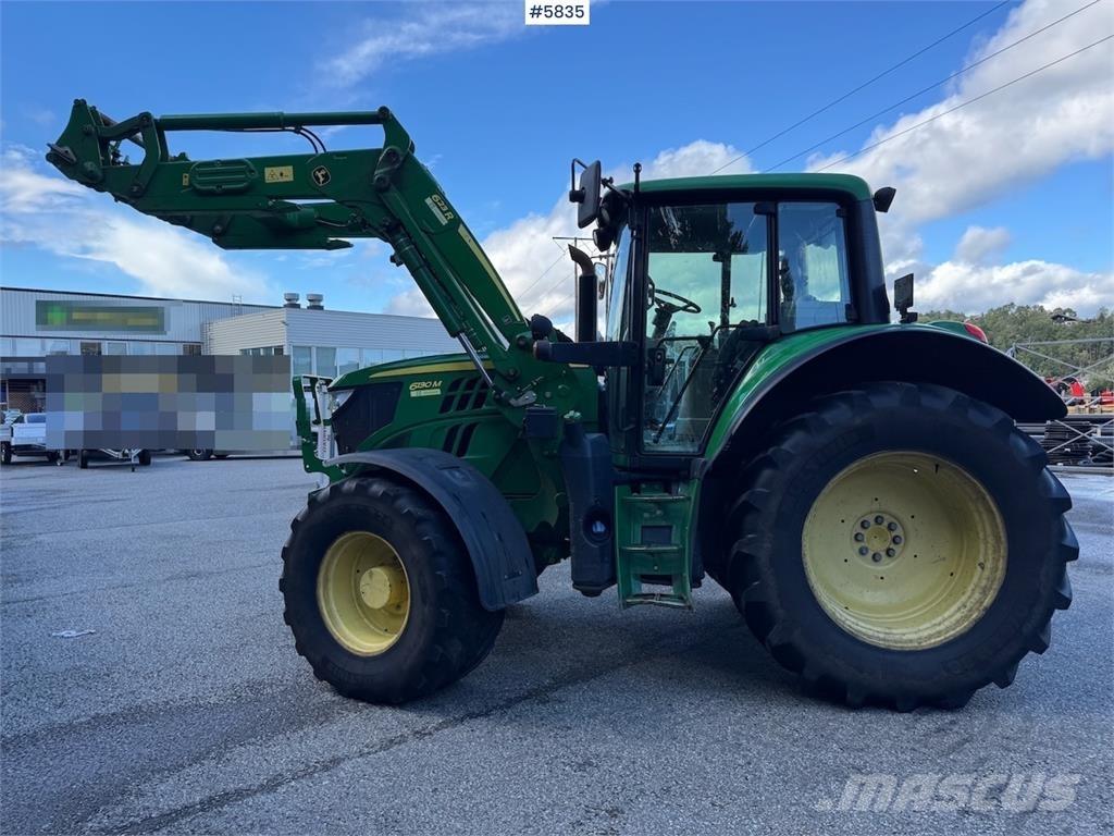 John Deere 6130M Traktoriai