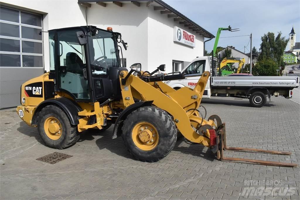 CAT 907M Naudoti ratiniai krautuvai