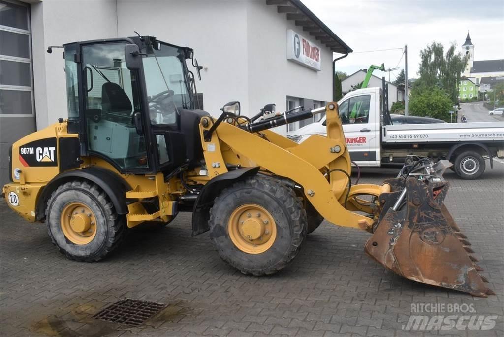 CAT 907M Naudoti ratiniai krautuvai
