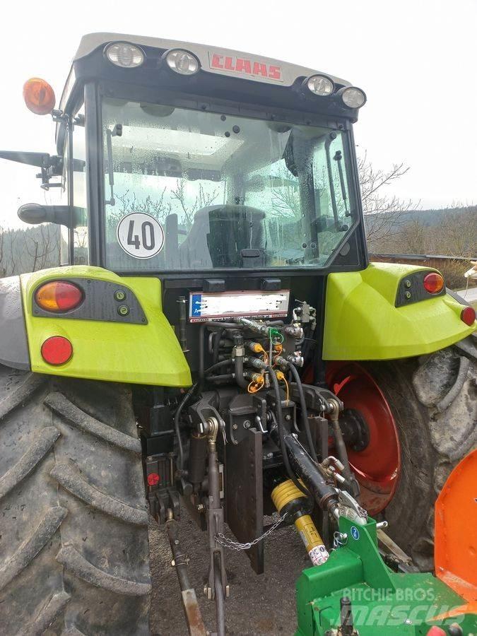 CLAAS Axos 330 CX Traktoriai