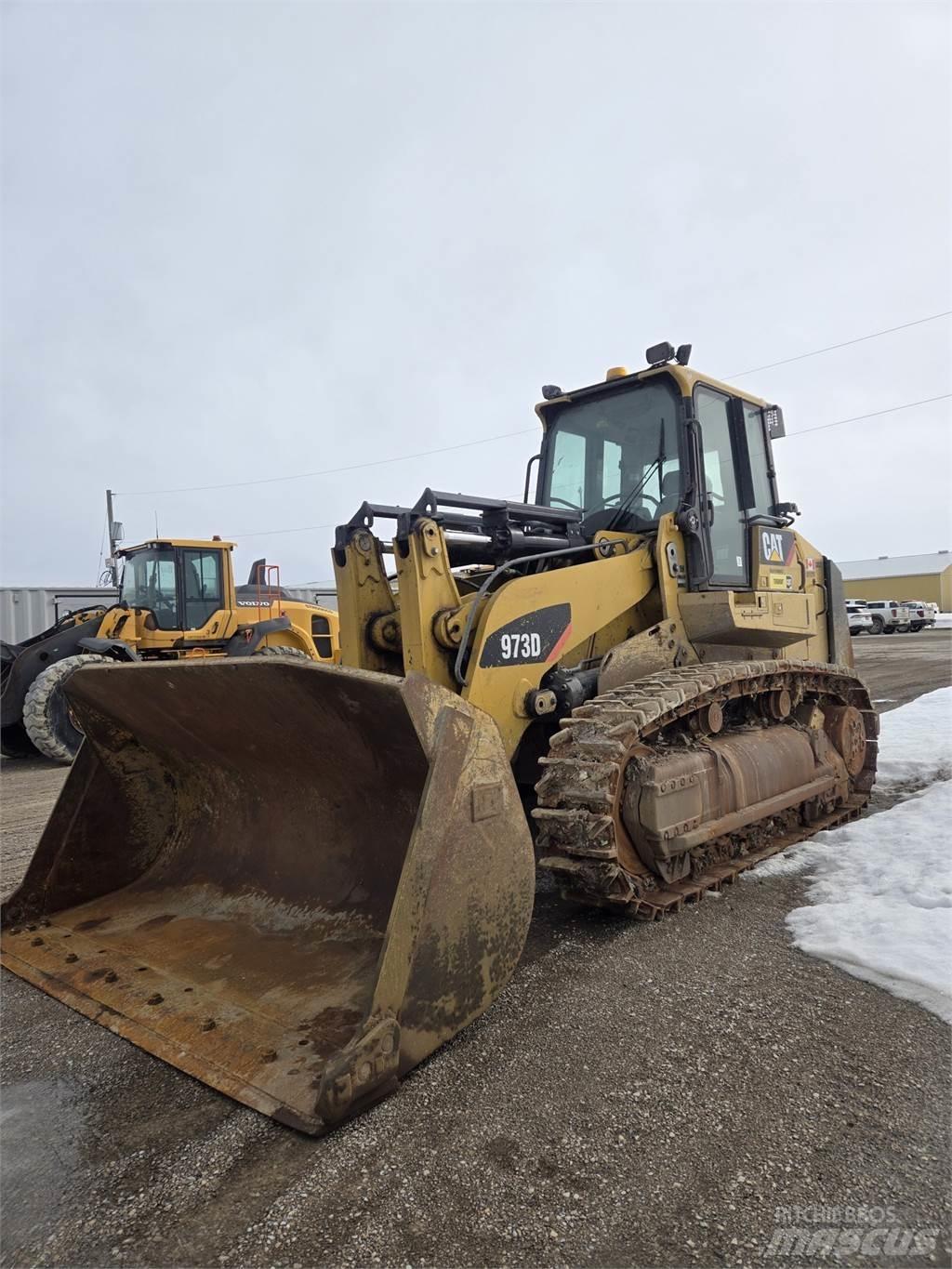 CAT 973D Statyba - Kita
