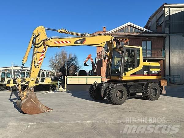 CAT M315 Ratiniai ekskavatoriai