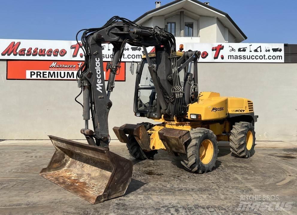 Mecalac 12MXT-E Ratiniai ekskavatoriai