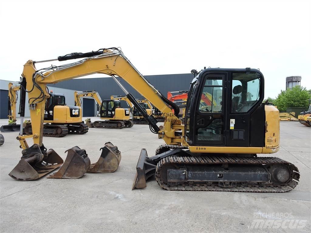 CAT 308 Statyba - Kita
