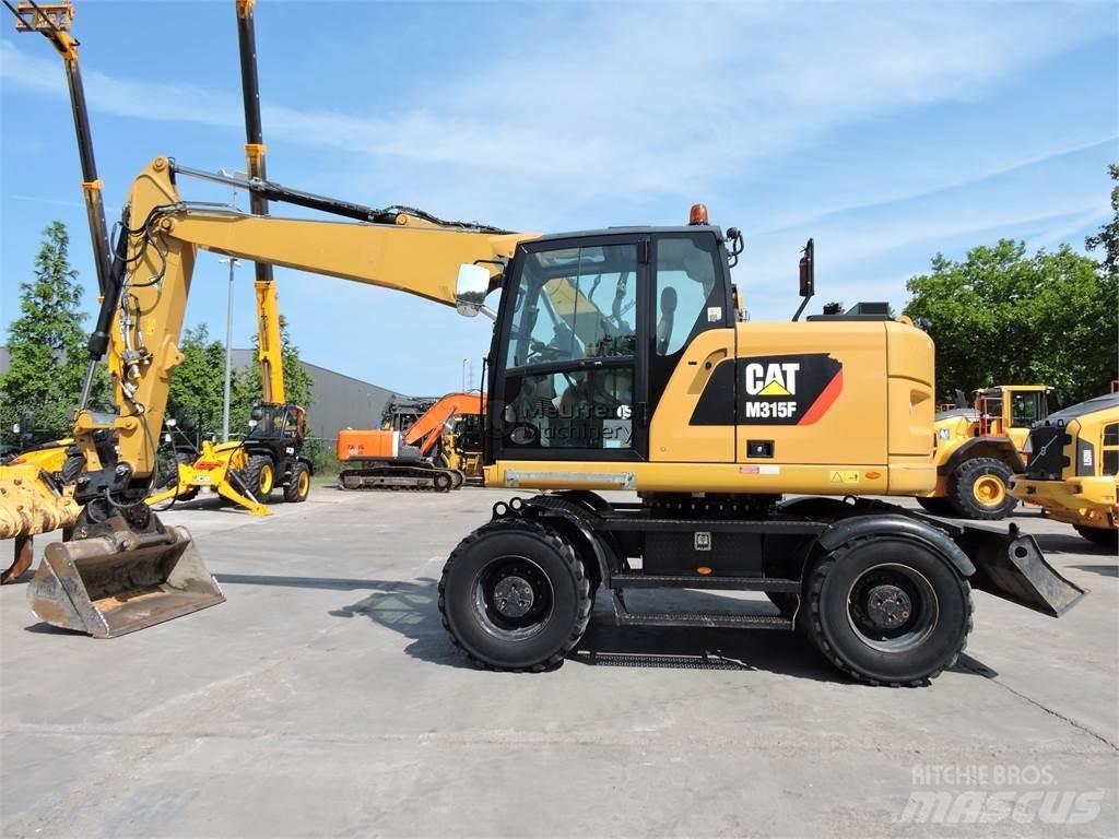 CAT M315 Ratiniai ekskavatoriai