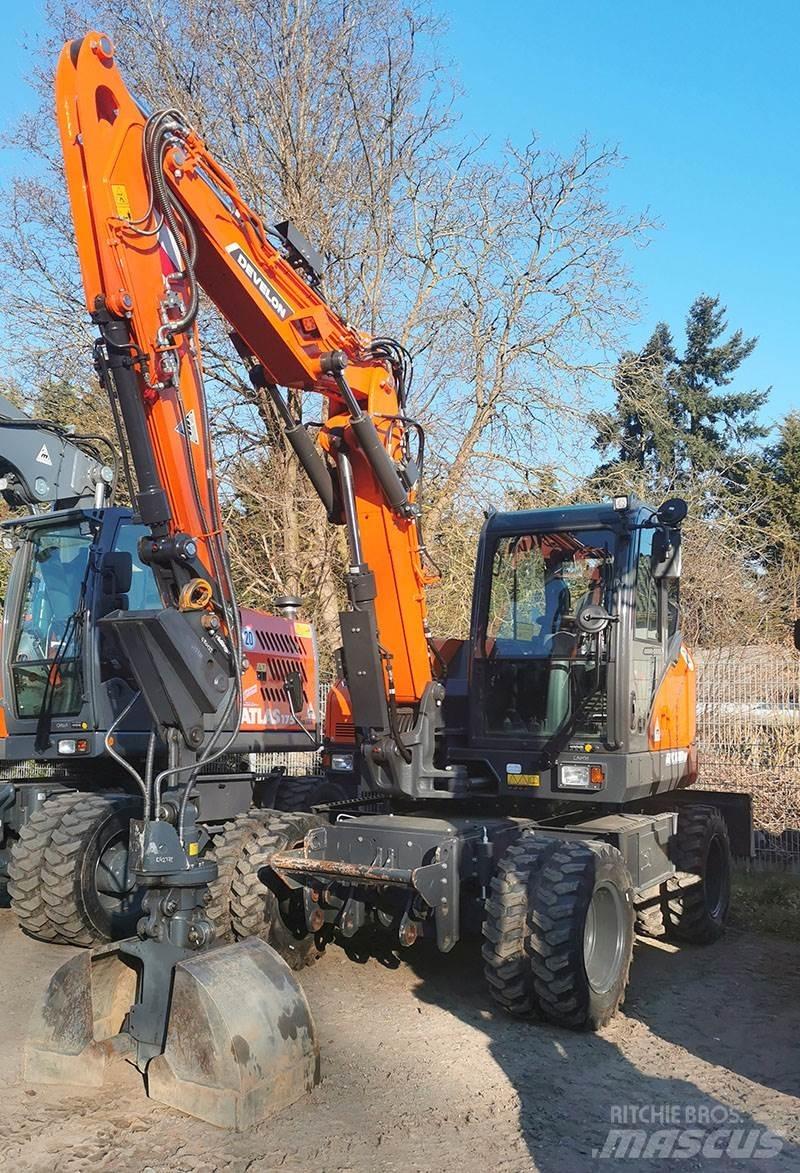 Develon DX 100 W-7 Ratiniai ekskavatoriai