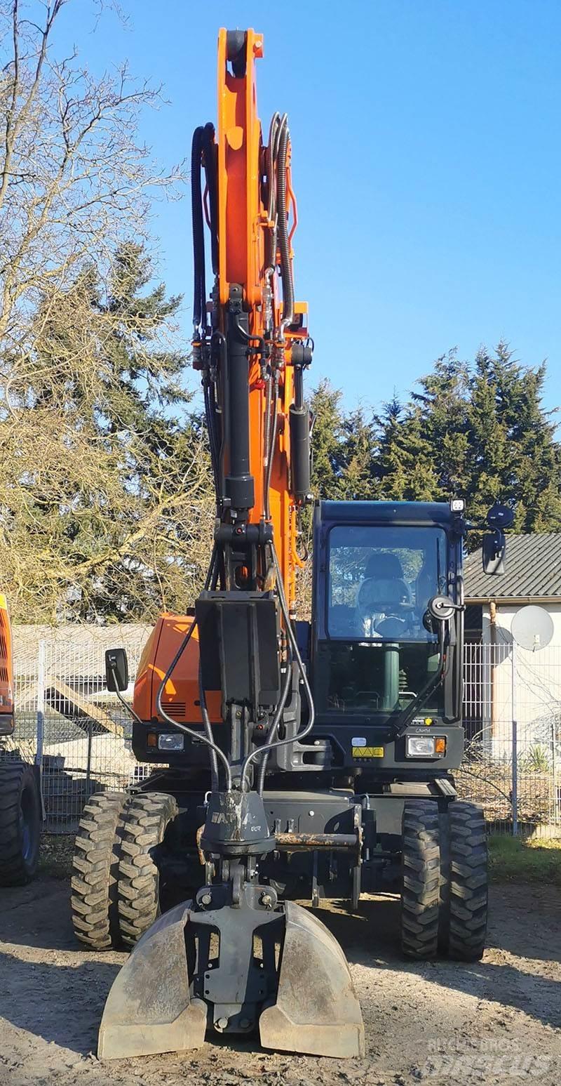 Develon DX 100 W-7 Ratiniai ekskavatoriai