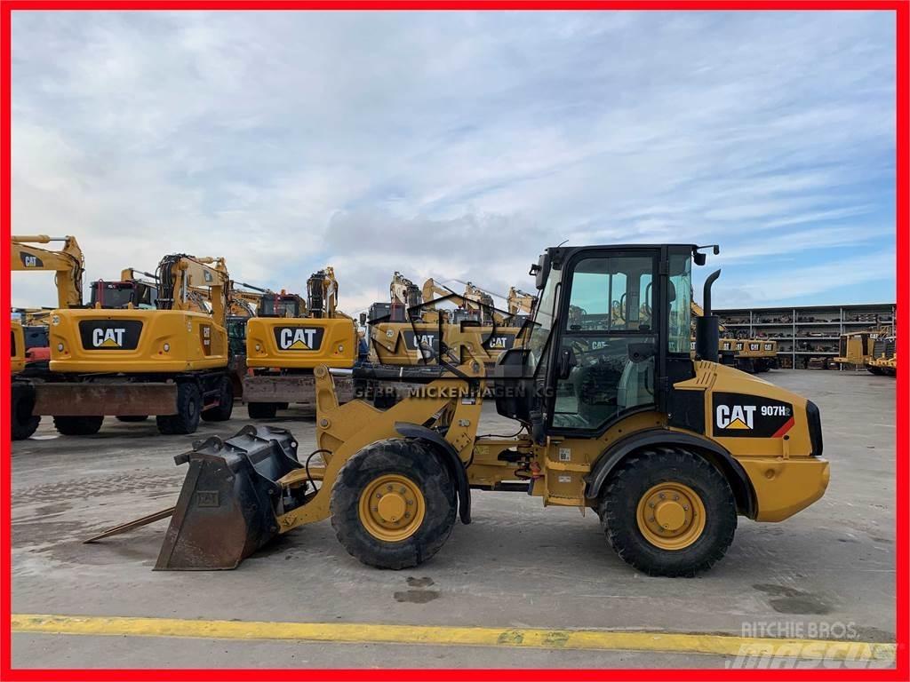 CAT 907H2 Naudoti ratiniai krautuvai
