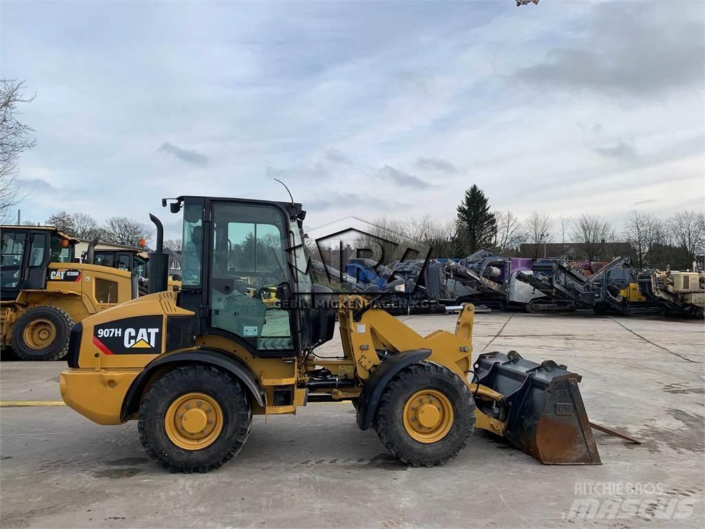 CAT 907H2 Naudoti ratiniai krautuvai