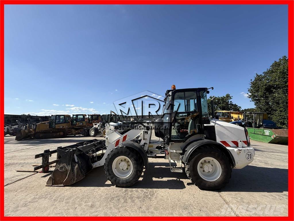 CAT 908 M Naudoti ratiniai krautuvai