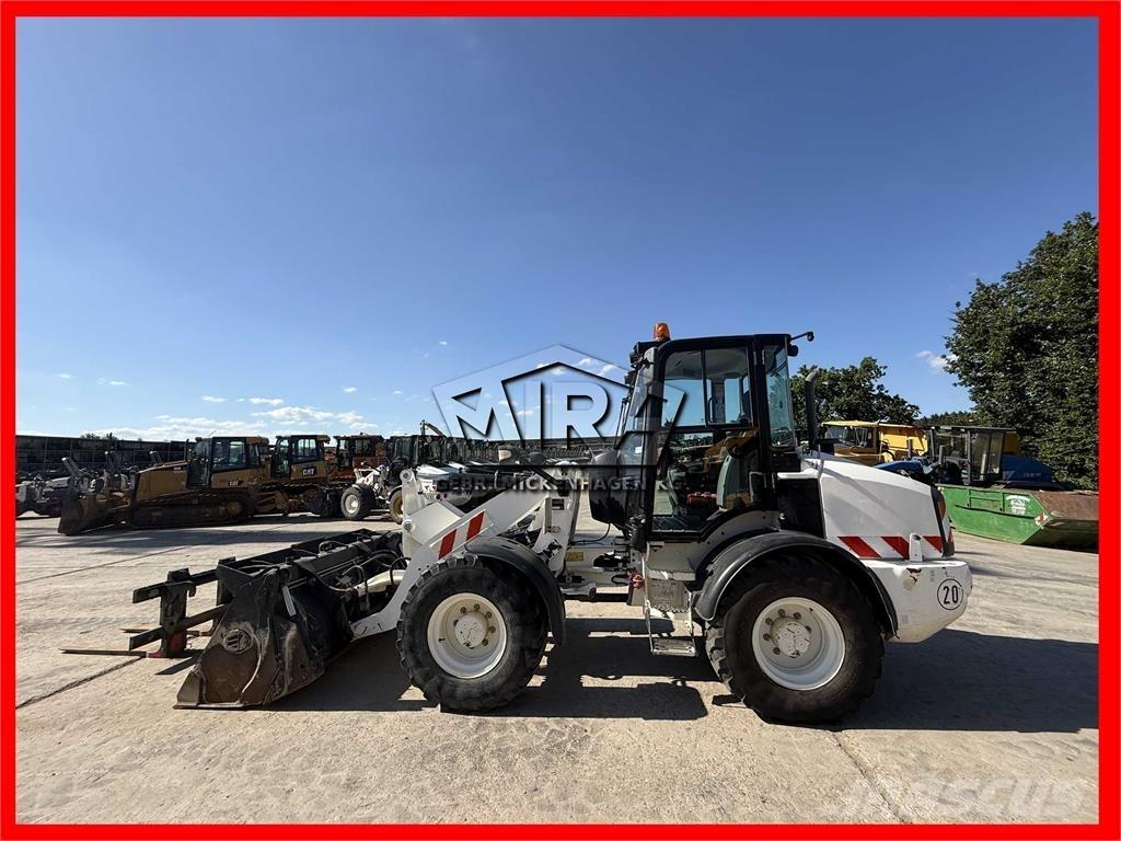 CAT 908M Naudoti ratiniai krautuvai