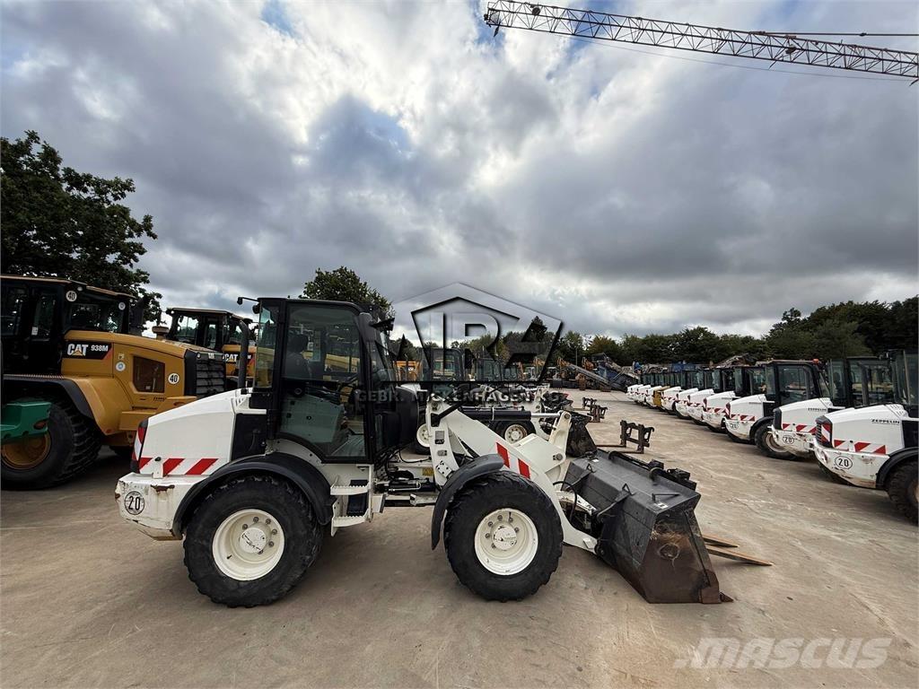 CAT 908M Naudoti ratiniai krautuvai