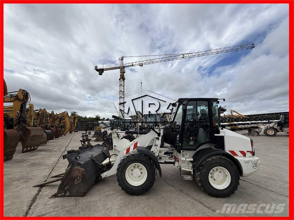 CAT 908M Naudoti ratiniai krautuvai