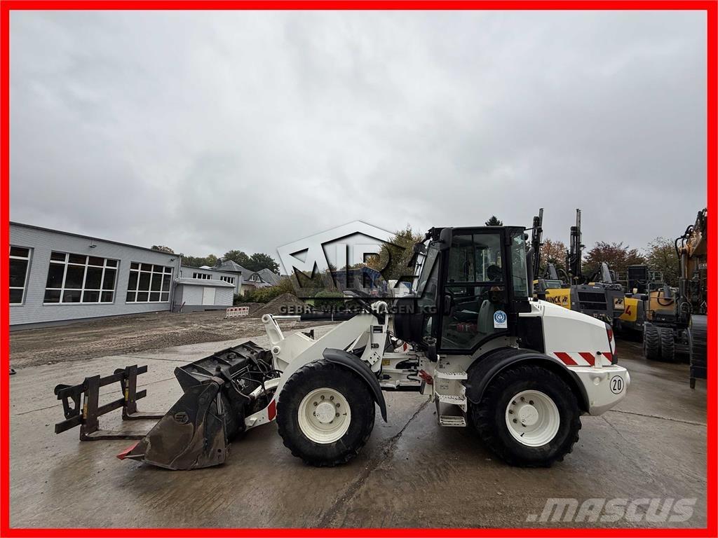 CAT 908M Naudoti ratiniai krautuvai