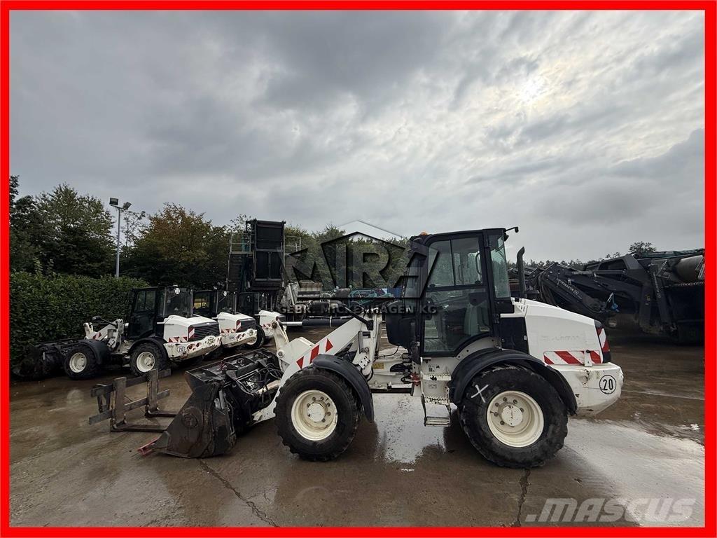 CAT 908M Naudoti ratiniai krautuvai