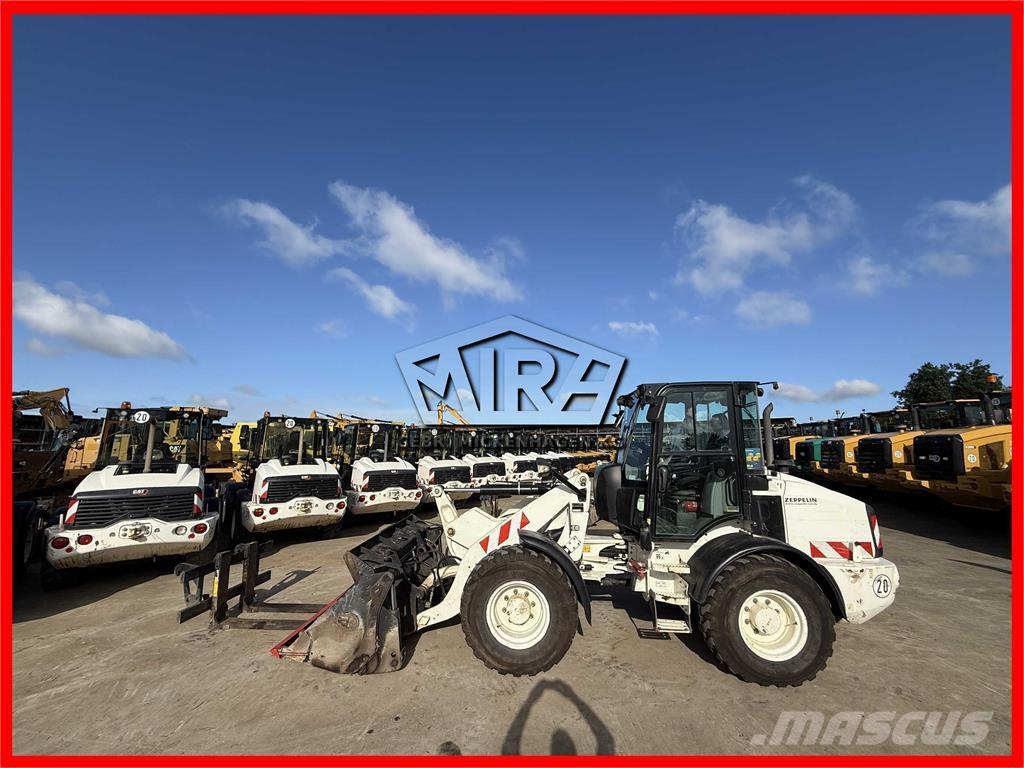 CAT 908M Naudoti ratiniai krautuvai