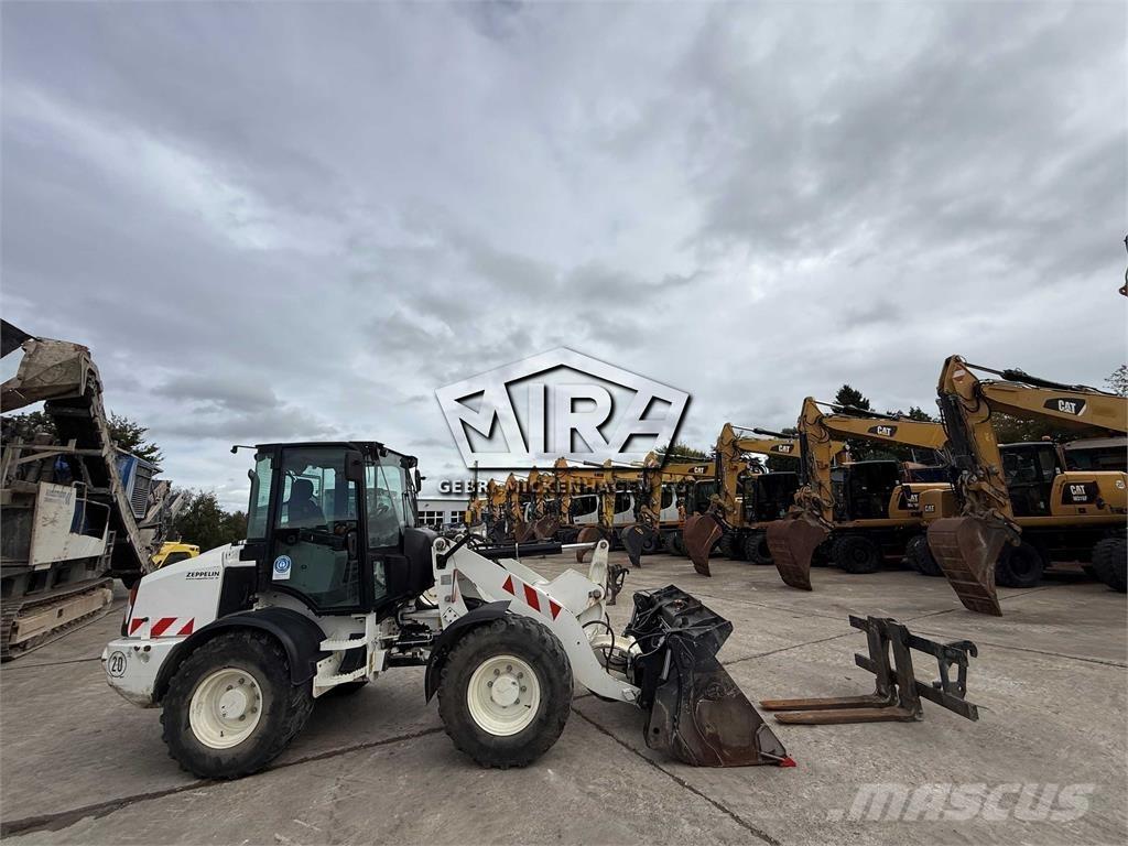 CAT 908M Naudoti ratiniai krautuvai