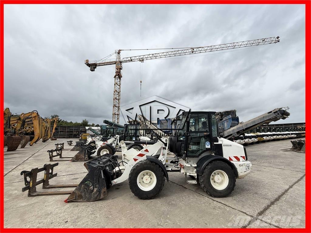 CAT 908M Naudoti ratiniai krautuvai