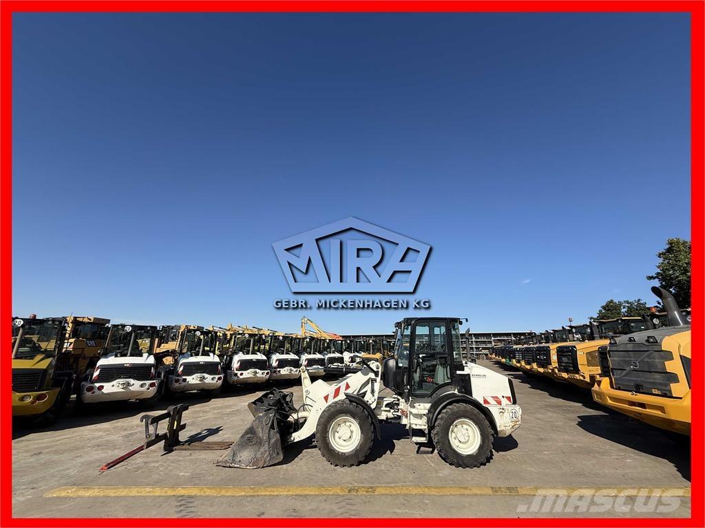 CAT 908M Naudoti ratiniai krautuvai