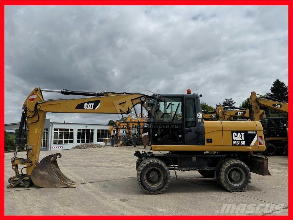 CAT M 318 D Ratiniai ekskavatoriai
