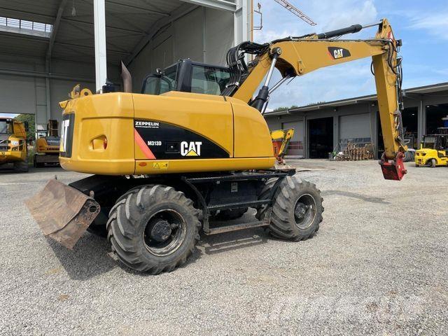 CAT 313 D Statyba - Kita