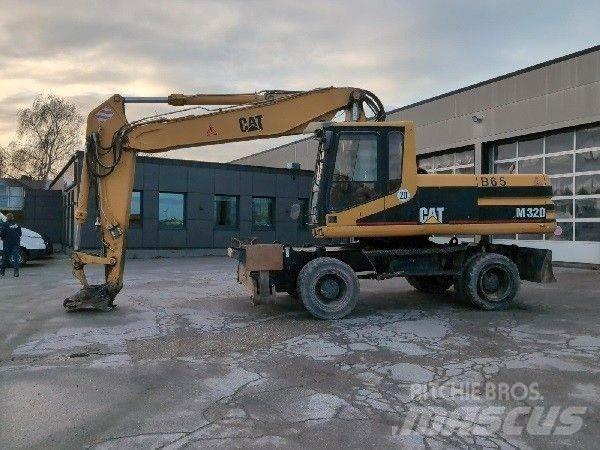 CAT M320 Ratiniai ekskavatoriai