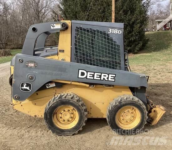 John Deere 318D Statyba - Kita