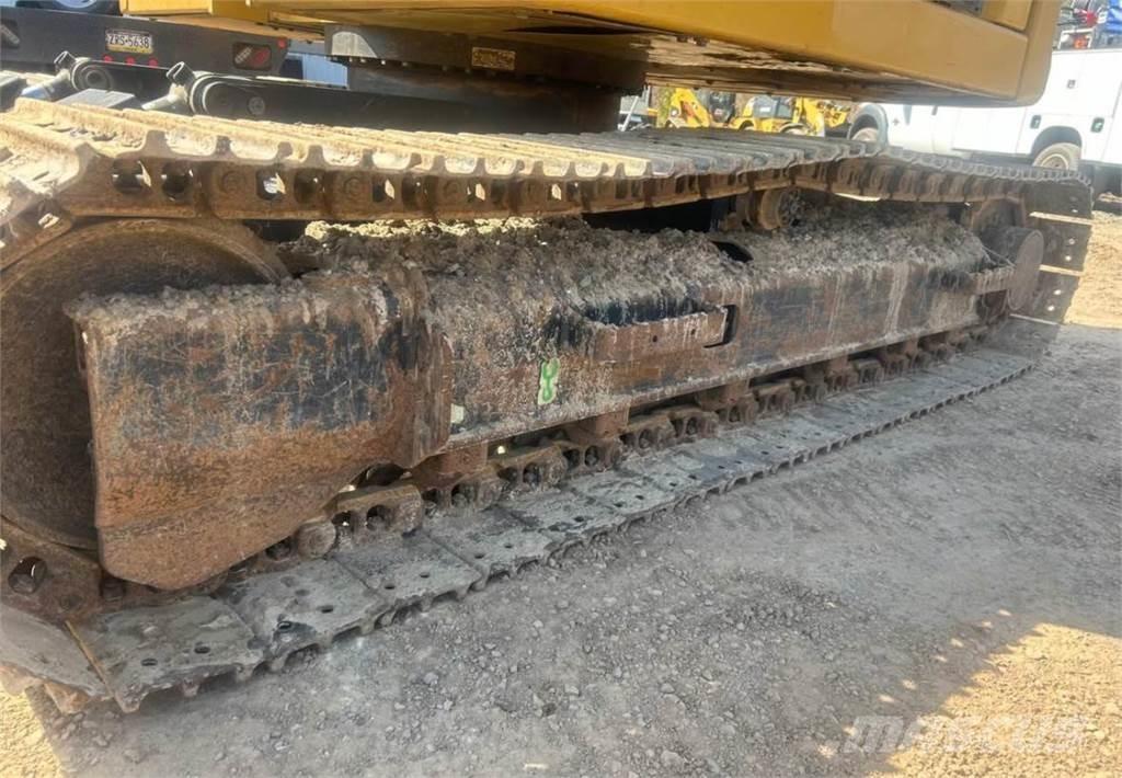 CAT 310 Vikšriniai ekskavatoriai