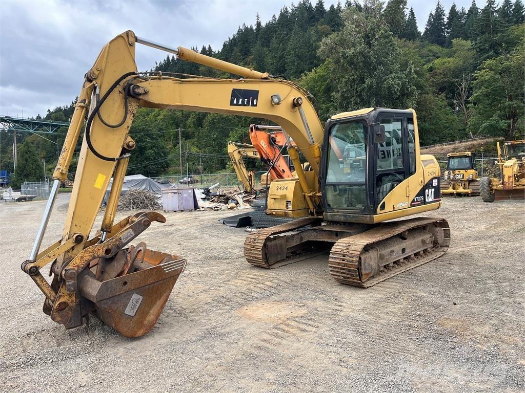 CAT 311C Vikšriniai ekskavatoriai