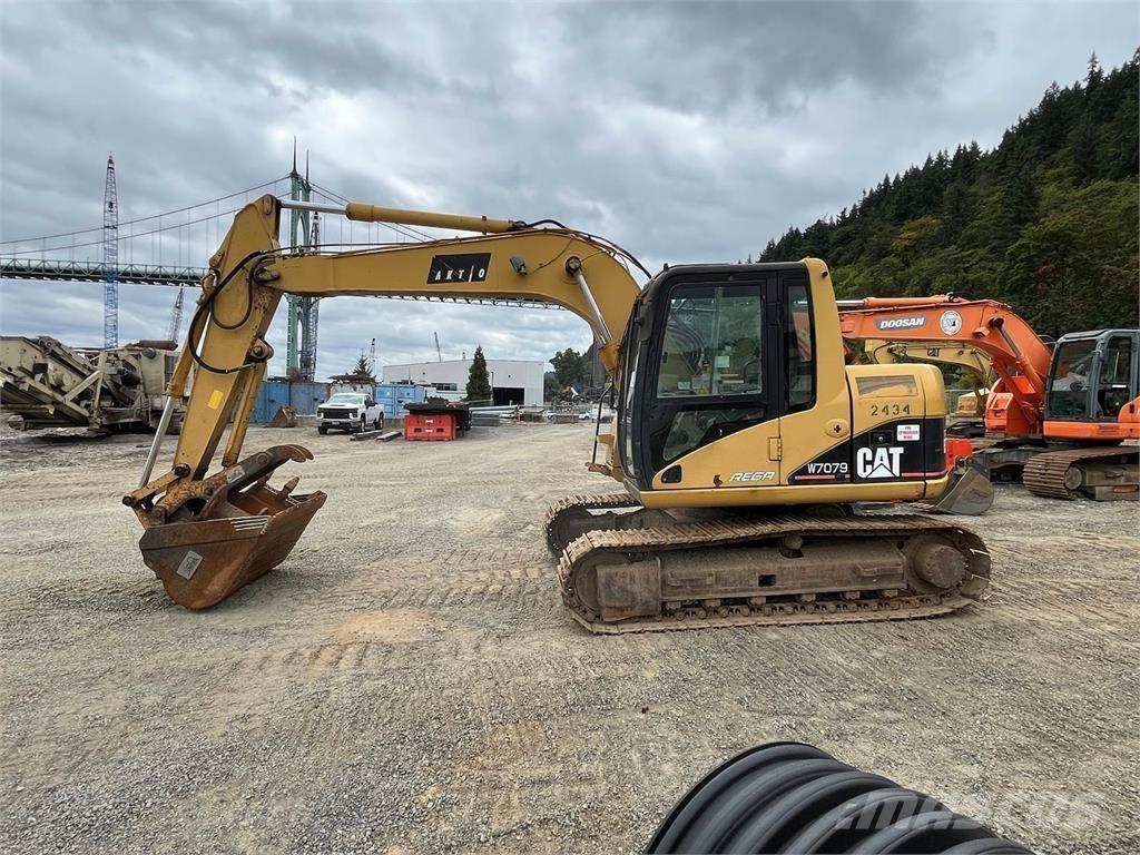CAT 311C Vikšriniai ekskavatoriai