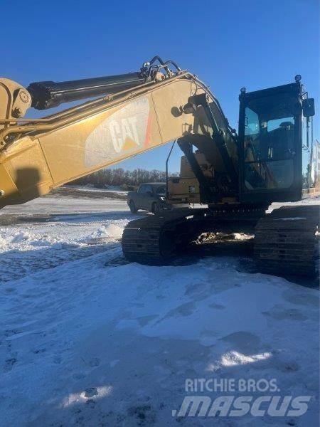 CAT 323FL Vikšriniai ekskavatoriai