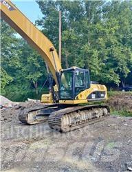 CAT 324DL Aukštuminiai ekskavatoriai