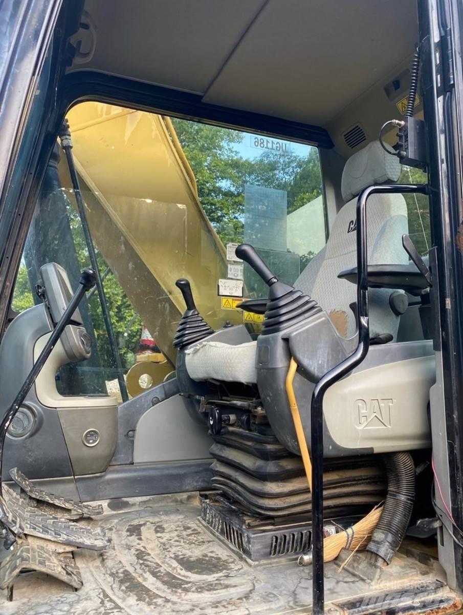 CAT 324DL Aukštuminiai ekskavatoriai