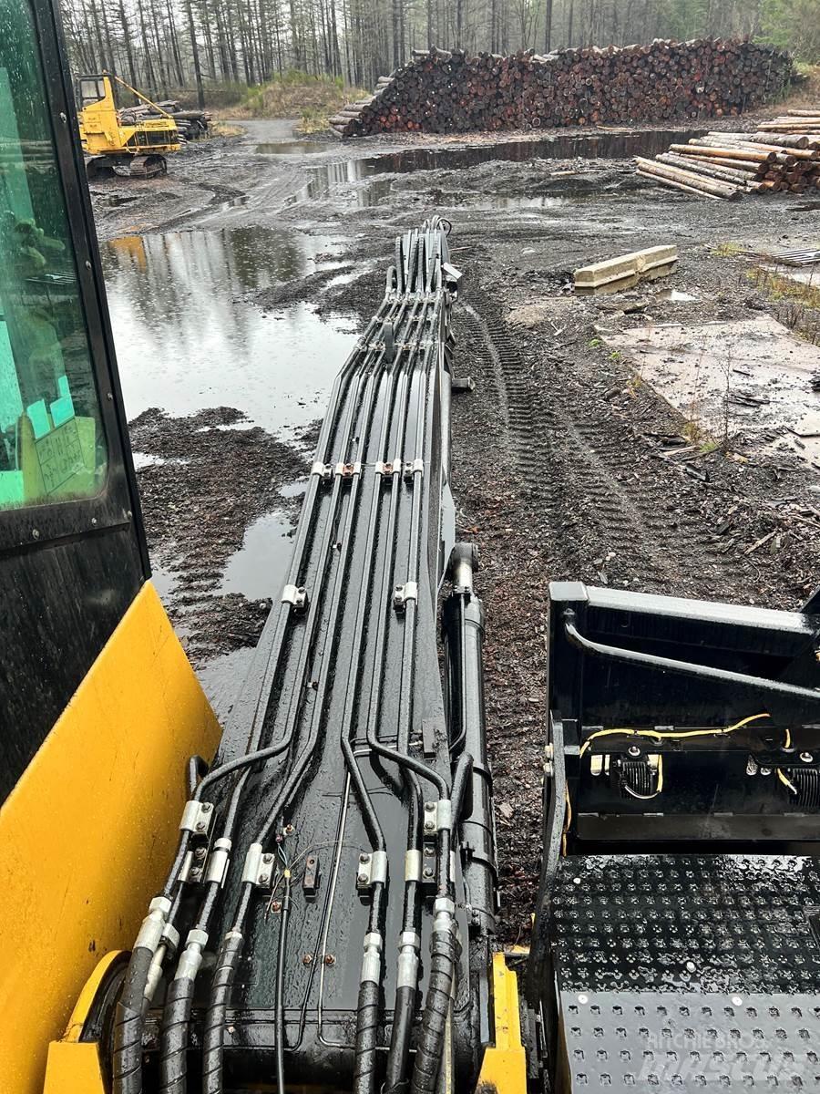 CAT 558LL Strėliniai krautuvai