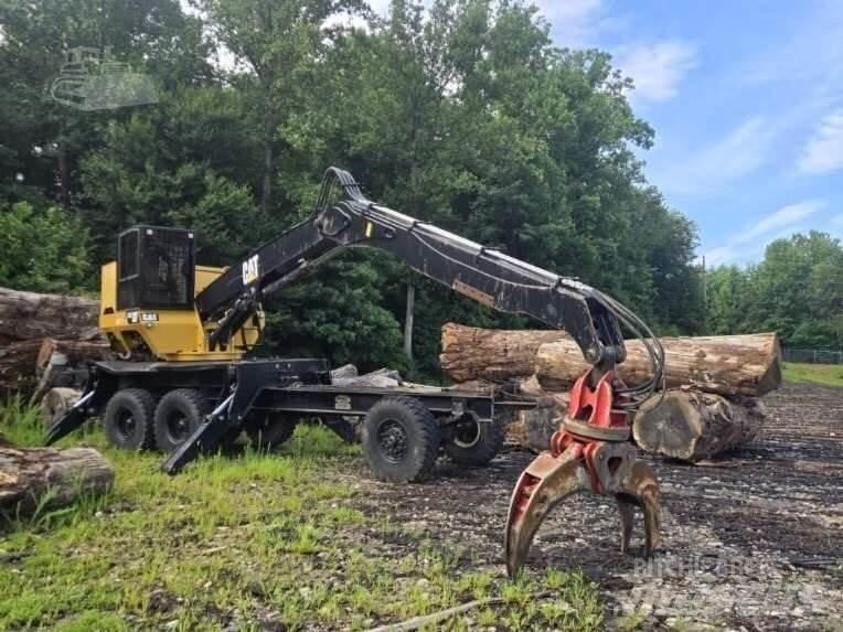 CAT 559C Strėliniai krautuvai