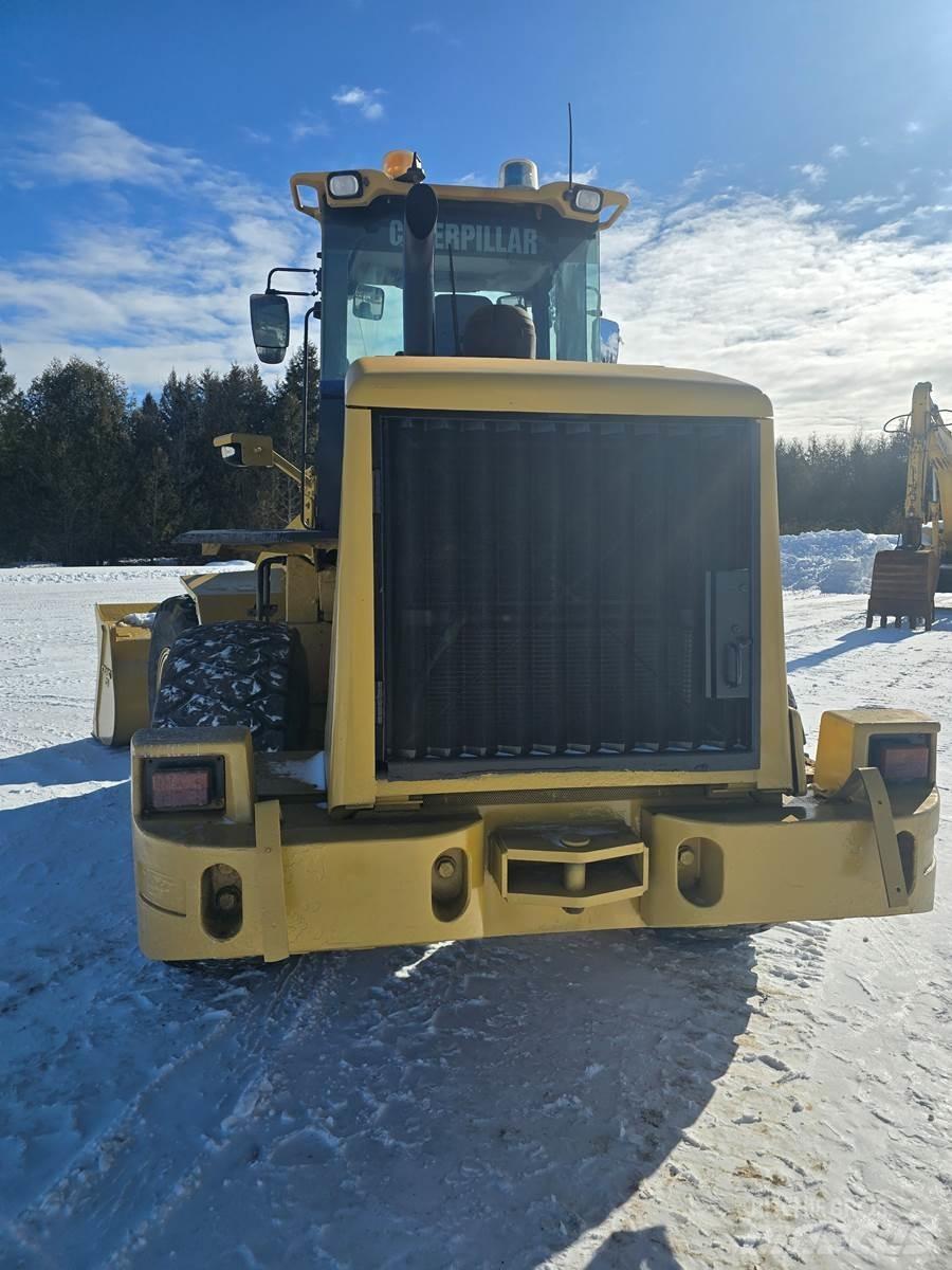 CAT 938H Naudoti ratiniai krautuvai