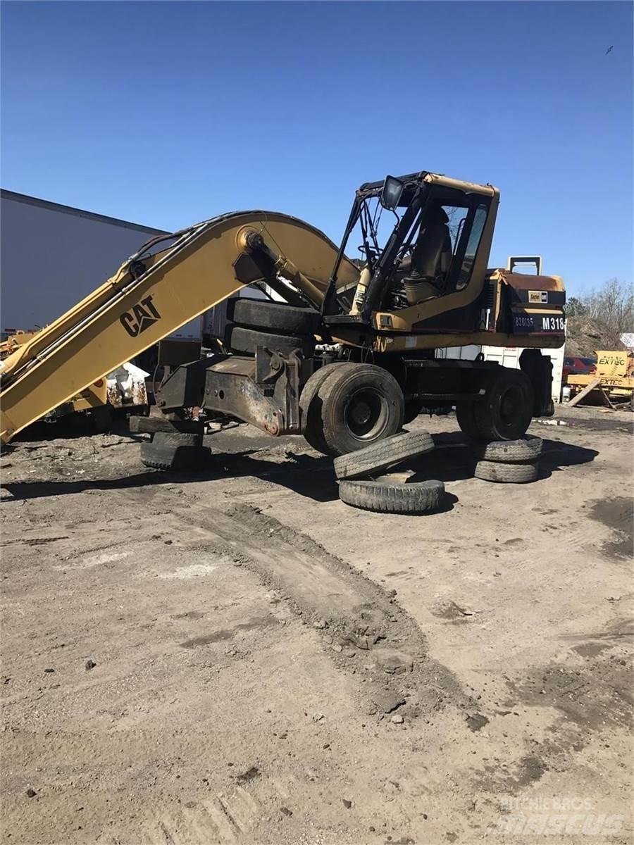 CAT M318 Ratiniai ekskavatoriai