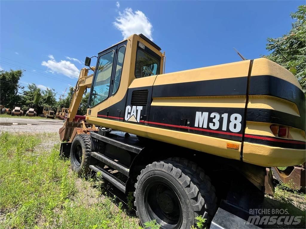 CAT M318 Ratiniai ekskavatoriai
